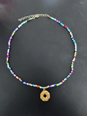 Ожерелье с пончиком - 18 дюймов - оранжевый пончик с брызгами - Изображение 1 из 2