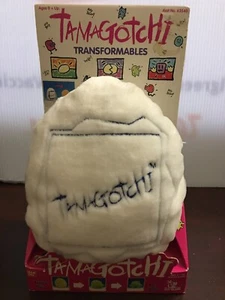 1997 Vintage Tamagotchi Transformables Box Pet Plush Egg Yellow White Reversable - Picture 1 of 24