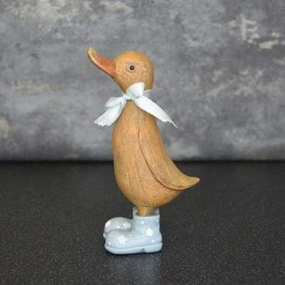 Маленькая резиновая фигурка утки в синем колодце с бантом 15,5 см - Изображение 1 из 3