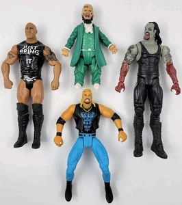 Lote de figuras de lucha libre de juguete WWE Hornswoggle Talking Rock Page DDP Zombie Undertaker - Imagen 1 de 9