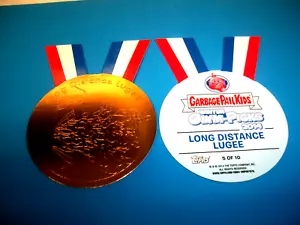 2014 Garbage Pail Kids Series1 Olym-Picks Medals Bronze--LONG DISTANCE LUGEE- #5 - Picture 1 of 1