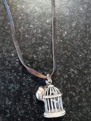 Fossil Birdcage Necklace Silver Tone With Bird Charm Lock Key on Leather Chain - Image 1 of 4