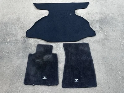 2009-2020 Nissan 370Z OEM Floor Mats 999E2—ZV002 - Изображение 1 из 4
