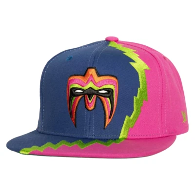 Sombrero Mitchell & Ness WWE The Ultimate Warrior azul/rosa pico plano para hombre Foto 1 de 4
