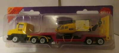 SIKU Super 1610 SCANIA ct14 Truck Low Loader with Trailer ADAC Helicopter Toy  - Image 1 of 4