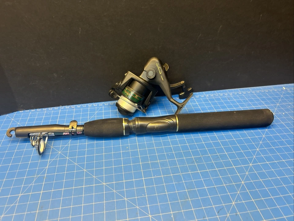 Carrete de pesca Coleman Outfitter CO100F mano derecha o izquierda con caña Foto 1 de 4