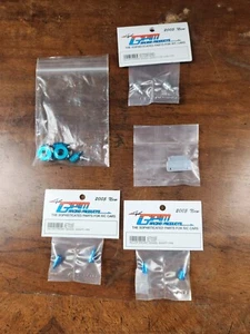 TEAM GPM RACING PRODUCTS ALU VORDERRADWELLE KONVOLUT - Bild 1 von 6