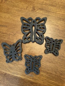 4 Vintage Gusseisen Untersetzer Schmetterlinge Löffelablage Wandbehang Deko - Bild 1 von 7