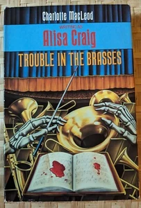 TROUBLE IN THE BRASSES By Alisa Craig & Charlotte MacLeod VERY GOOD HC/DJ - Picture 1 of 4