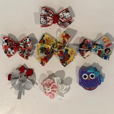 Lote de 7 pinzas para el cabello lazos variedad de colores y diseños para bebé niña Foto 1 de 4