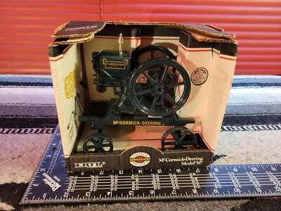 Ertl McCormick Deering Model M 1/6 diecast hit & miss replica collectible - Image 1 of 4