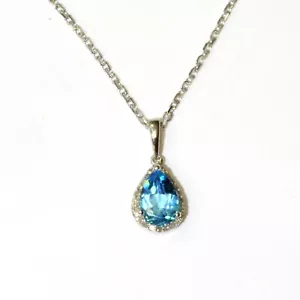 Collana con ciondolo aureola topazio blu pera diamante I1 H argento sterling 925 .12ct I1 H - Foto 1 di 6
