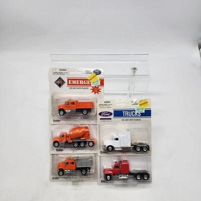 UH Boley 1:87 Die Cast Orange International Concrete Dump Stake Truck Ford Semi - Image 1 of 4
