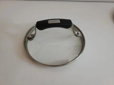 "Llanta exterior Paula Dean PD 5-7/8", labio interior de 5-3/8", tapa de acero inoxidable de vidrio templado" Foto 1 de 2