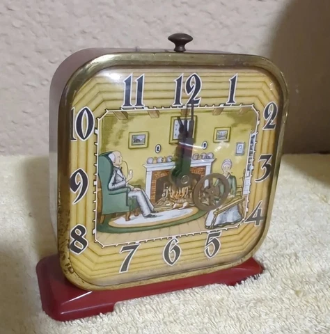 Vintage 1939 Lux Motion Alarm Clock (Spinning Wheel) Metal Made USA Cover