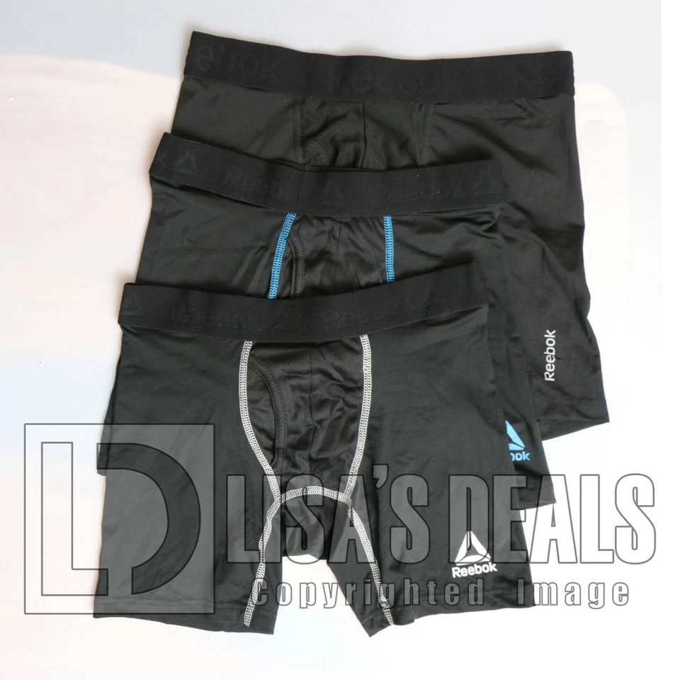 Nuevo paquete de 3 calzoncillos boxer de rendimiento Reebok para hombre negro azul línea blanca S Foto 1 de 1