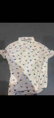 7 golf polos,  swannies, under armour,  puma, petergreat condition barely used,  - Image 1 of 4