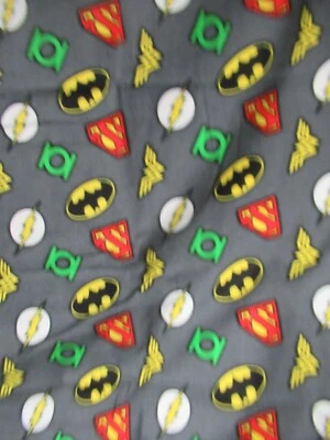 Camelot Fabrics  DC Comics, Justice League Logos on Grey FLANNEL FABRIC SBTYX42 - Image 1 of 4