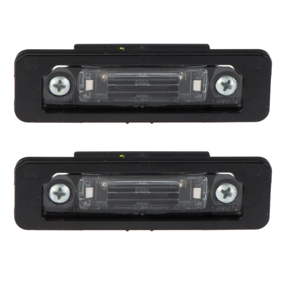 Juego de luces de matrícula traseras OEM NUEVO (2) Ford Lincoln Mercury 8T5Z13550B Foto 1 de 4