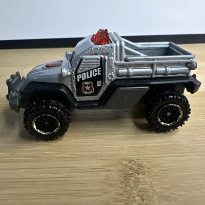 2014 Matchbox #MB65 MBX Heroic Rescue Road Raider Police Silver & Black - Image 1 of 4