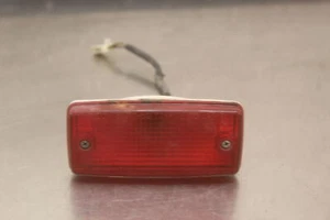 1986 Suzuki Quadrunner 230 LT230GE 2x4 LEFT REAR TAILLIGHT BACK BRAKE LIGHT C323 - Picture 1 of 7