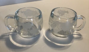 (2) Vintage 1970's The Nestle Co. Clear Etched Glass Globe World Coffee Mug 8 oz - Picture 1 of 10
