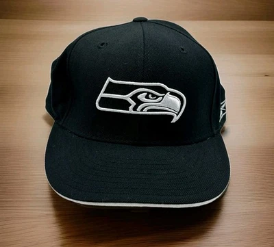 Gorra ajustada Seattle Seahawks talla 8 Reebok NFL negra logotipo auténtica forrada  Foto 1 de 4