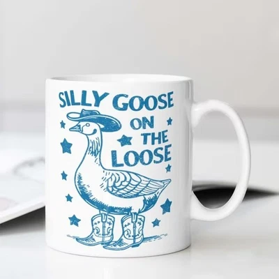Taza suelta Silly Goose On The Divertidas botas de vaquero pato pájaro taza de café 11 oz 15 oz Foto 1 de 4