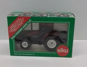 Siku Farmer 2653 Traktor New Holland L 75 FIATAGRI, korallenrot, 1:32, OVP - Picture 1 of 3