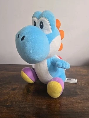 Brinquedo de pelúcia Nintendo Little Buddy Super Mario Bros azul claro Yoshi 8" - Imagem 1 de 4
