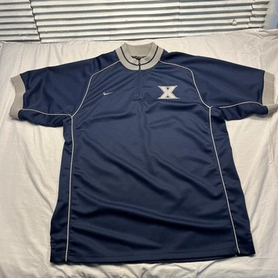 Camisa Xavier Mosqueteros Para Hombres Grande Azul Nike Cuarto Cremallera Pullover Atlético NCAA Foto 1 de 4
