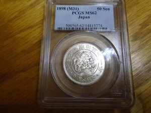 1898 (M31) Japan Silver 50 Sen Y25 NGC MS62 - Picture 1 of 2