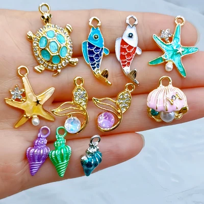 110 Pcs mix Ocean fan conch Charm bracelet necklace Pendant DIY Jewelry Making - Image 1 of 4