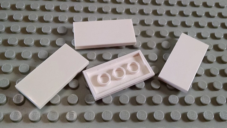 LEGO Lot of 4 White 2x4 Flat Smooth Finishing Tile Pieces - Image 1 of 1