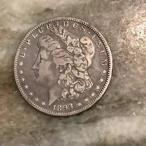 1893-O Silver Morgan Dollar VF - Picture 1 of 2