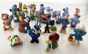 Ü-Eier-Figuren -u.a. Nachtwächter-Schlumpf, Donalds Flotte Familie, Limoschlumpf - Bild 1 von 20