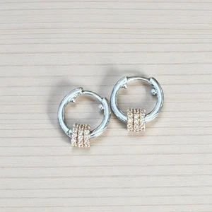  Orecchini a cerchio Huggie in argento e oro - Foto 1 di 4