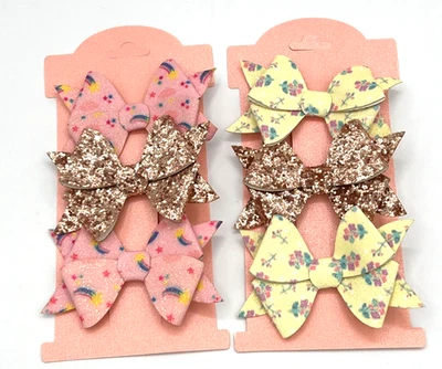 Juego de moños brillantes - Estampado arco iris y moños florales - Juegos de 6 pinzas para el cabello para niñas Foto 1 de 4