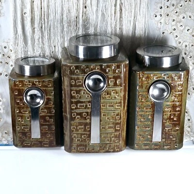 3 Pc. Pier 1 Canister Set Olive Green/Brown Screw Top Clear Lid w/Magnetic Spoon - Image 1 of 4