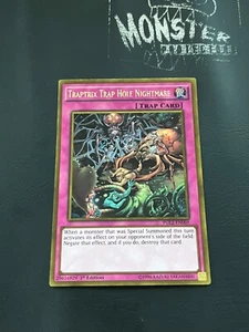 YUGIOH TRAPTRIX TRAP HOLE OF NIGHTMARE PREMIUM GOLD RARE PGL2-EN069 1ST EDITION - Picture 1 of 2