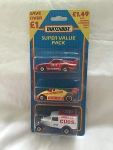 MATCHBOX MB858 TRIPLE PACK PORSCHE 935 - F1 RACER - MODEL A ' CUBS ' - Picture 1 of 2