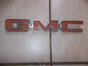 1975-1980 GMC Truck Jimmy Tailgate Trim Panel Emblem OEM