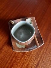 Japanese stoneware tea cup in Raku style