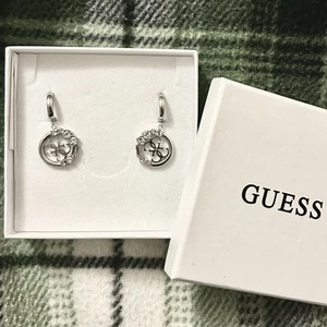 GUESS Rhodium Plated Huggie Earrings With Monogram Pendant And Zirconium Accents - Picture 1 of 6