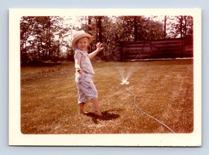 Vintage Photograph Cute Girl Plays in Water Sprinkler Backyard Garden Hose 1965 - Picture 1 of 2