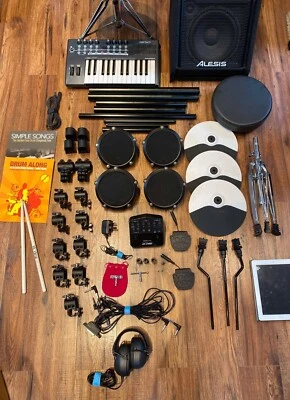 Kit de batería eléctrica ALESIS DEBUT CAJA CRASH RIDE TOM TELAR ABRAZADERA MÓDULO PEDAL PLATILLO 9V Foto 1 de 4