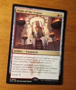MTG 1x Aegis of the Legion, NM, Ravnica: Clue Edition, Equipment Shield Counters - Picture 1 of 1
