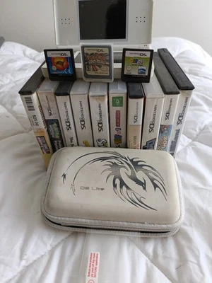 Nintendo DS Lite + Games (TESTED) - image 1 of 4