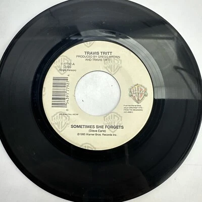 Travis Tritt Sometimes She Forgets Record 45 RPM Vinyl Foto 1 de 2