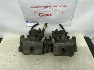 Par de pinzas de freno traseras izquierda derecha Toyota Corolla 90-92 GEO Prizm 1988-1991 - Imagen 1 de 7